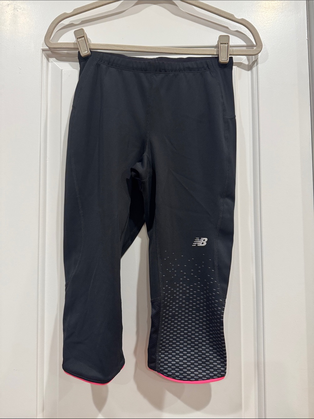 New Balance Black Capri Leggings with Pink Hem and Reflective Detail